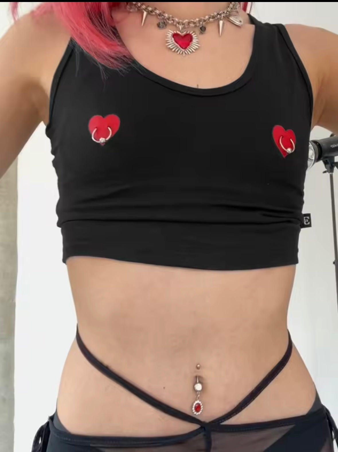 Heart print faux piercing crop top