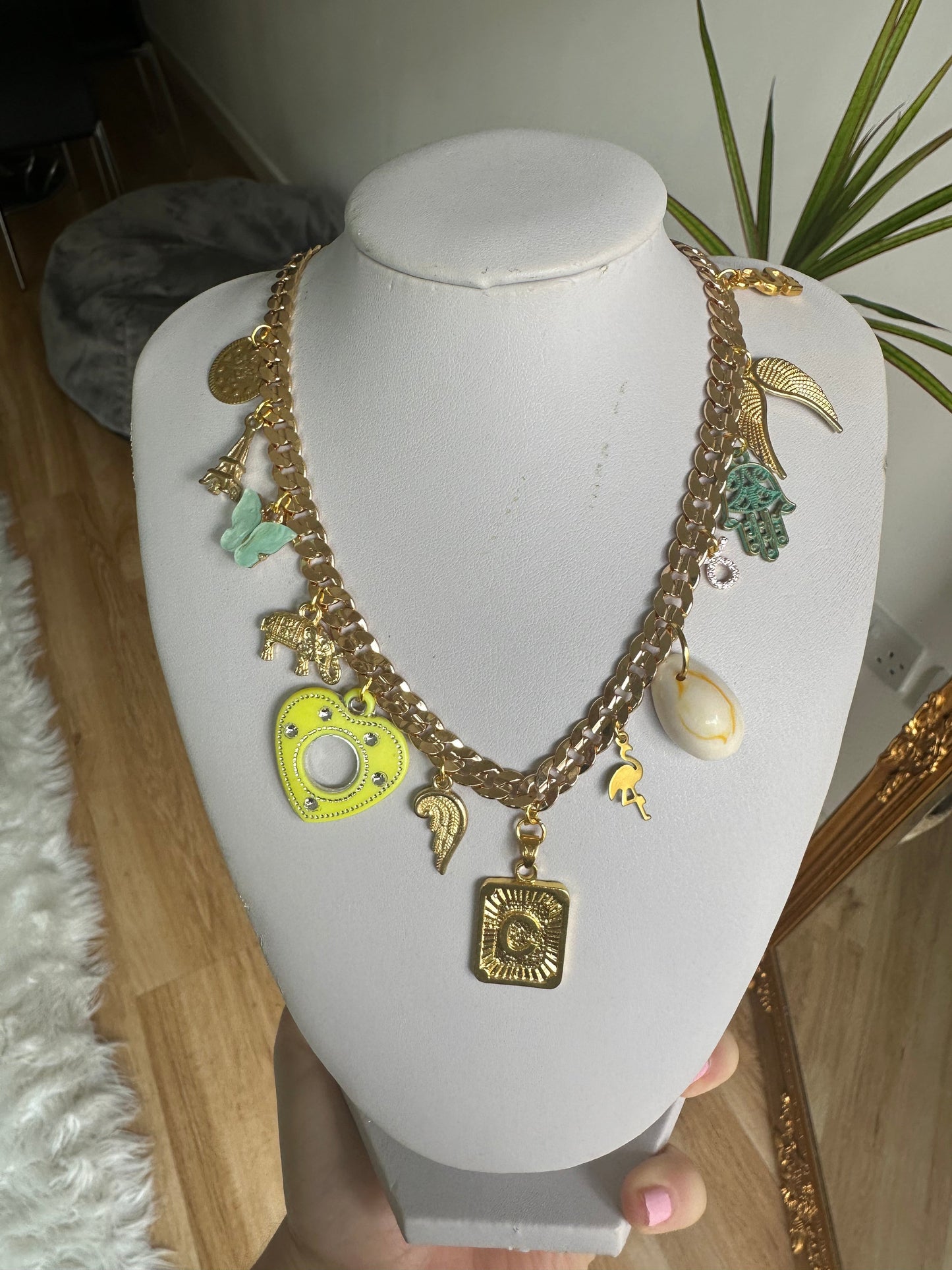 Gold multi charm letter necklace