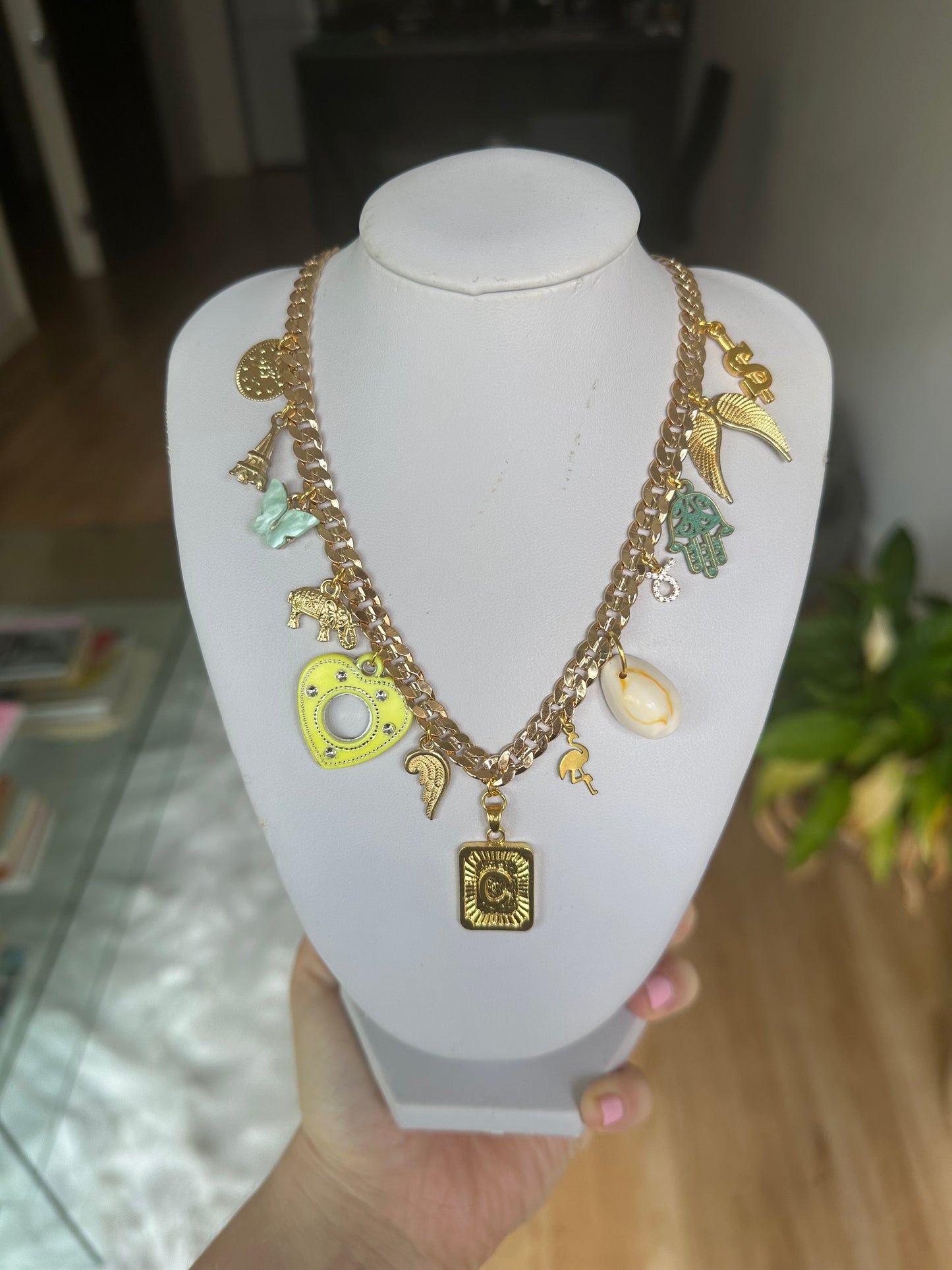 Gold multi charm letter necklace