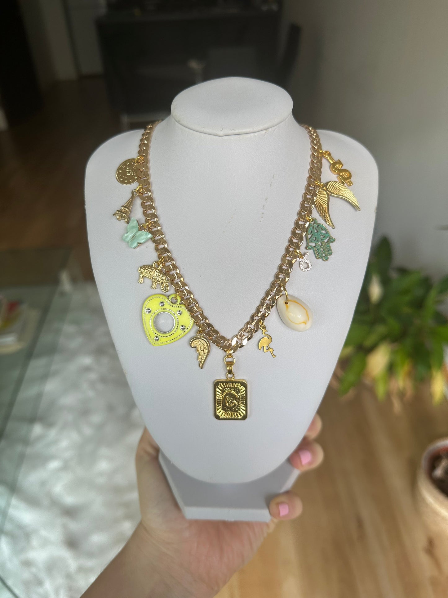 Gold multi charm letter necklace