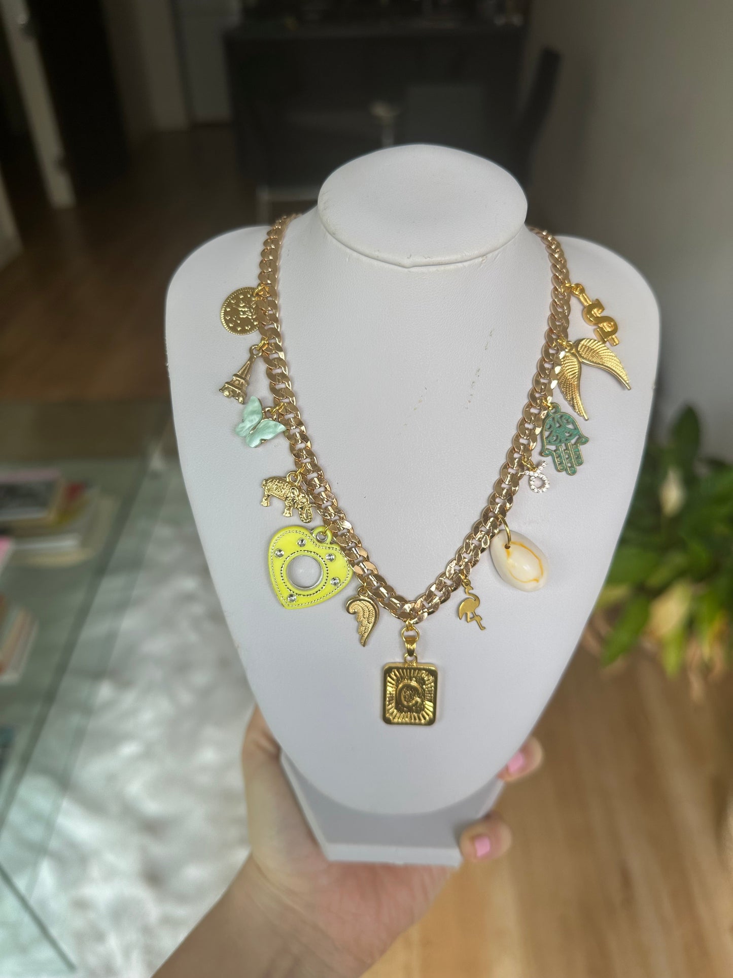 Gold multi charm letter necklace