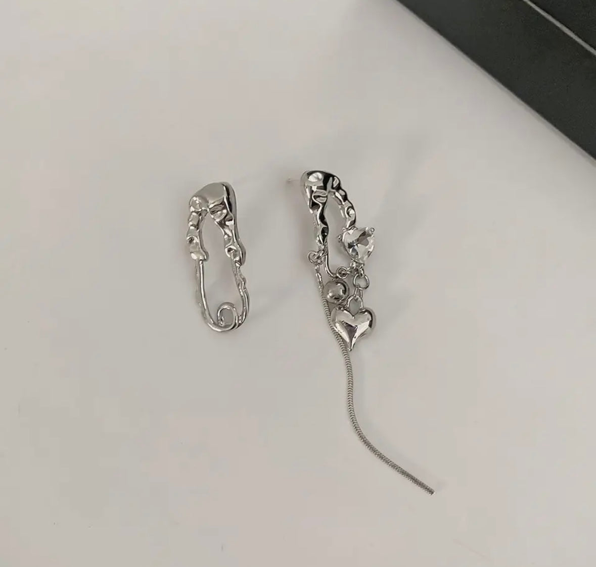 Asymmetrical earrings