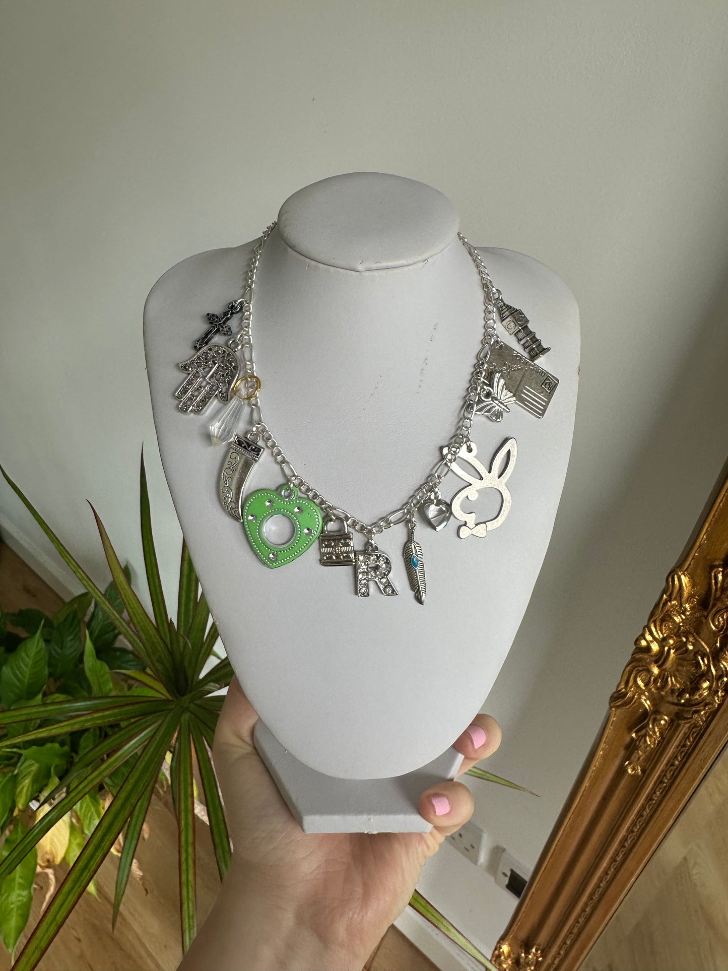 Silver multi charm necklace